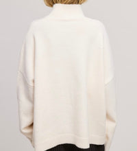 solid-knit turtleneck sweater