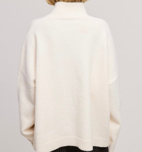 solid-knit turtleneck sweater