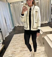 white tweed jacket