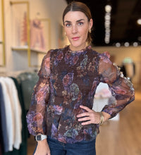 brown smocked floral blouse