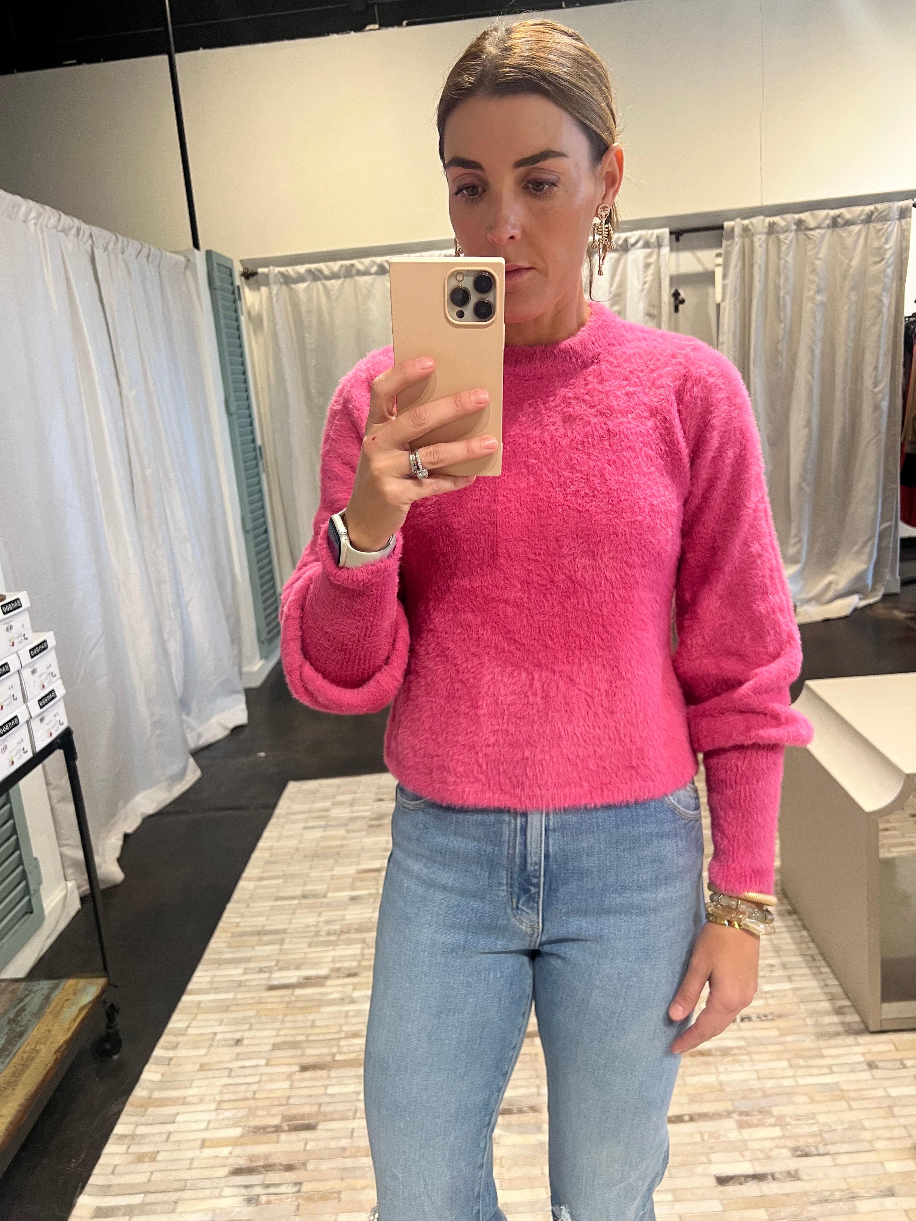 furry pink sweater